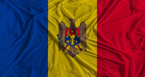 Moldovan flag with fabric texture background. National flag of Moldova