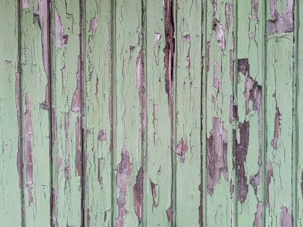 Old wooden door with peeling paint, texture, background, Germany