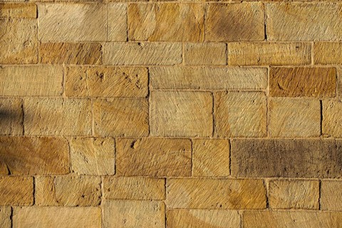 Yellow sandstone wall, sandstone wall, background, texture, Münsterland, North Rhine-Westphalia,