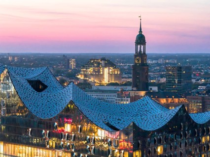 Aerial view of the Elbphilarmonie with St Michael's Church and Hamburg Bunker in the background at