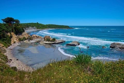 Beach and coastal landscape with blue sky, Cape Foulwind, West Coast, South Island, New Zealand