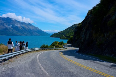 Travellers enjoy the view of the lake and mountains, Devil's Staircase Lookout Point, Kingston,