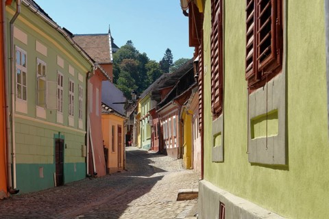 Street scenery in Sighisoara, a city in Transylvania located in Romania