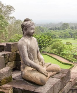 Buddha sculpture at a temple named Borobudur located in Java, a island of Indonesia