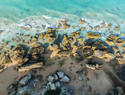 The Roche coves at he Mediterranean Sea. Aerial view. Drone shot. Cádiz province, Andalusia, Spain