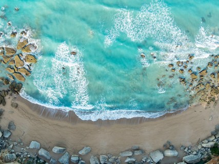The Roche coves at he Mediterranean Sea. Aerial view. Drone shot. Cádiz province, Andalusia, Spain