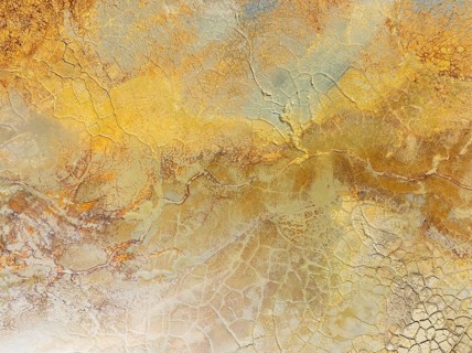 Abstract patterns in a waste pond in the mineral-rich area of the Rio Tinto mines. The colour is
