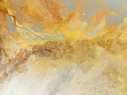 Abstract patterns in a waste pond in the mineral-rich area of the Rio Tinto mines. The colour is