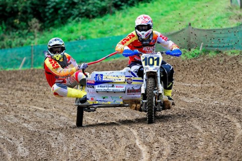 Motocross, Rudersberg, Baden-Württemberg, Germany, Europe, Rider with sidecar races through muddy