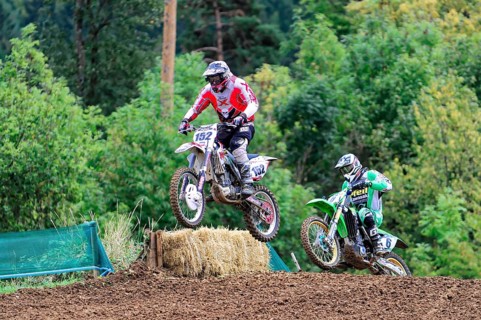 Motocross, Rudersberg, Baden-Württemberg, Germany, Europe, Two motocross riders jump over a mound