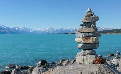 Stacked stones seen around Lake Pukaki at the South Island of New Zealand