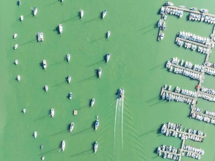 Sports and fishing boats at the marina of the fishing village of Sancti Petri. In the marshland of