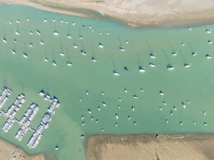 Sports and fishing boats at the marina of the fishing village of Sancti Petri. In the marshland of
