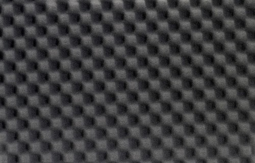 Full frame background of black foam plastics