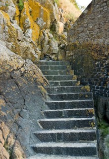 Stairs around the Mont Saint Michel Abbey in Lower Normandy France at evening time