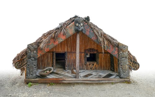 Traditional Maori sleep house seen in New Zealand, gradient isolated in white back