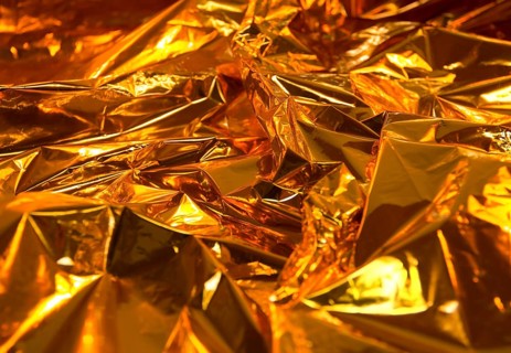 Full frame creased gold foil background