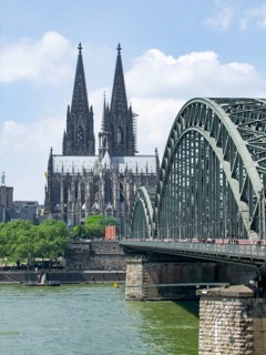 Waterside scenery with cologne cathedral and hohenzollern bridge in Cologne, a city in North