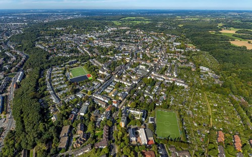 Aerial view, residential area district Gerresheim, sports field football stadium DJK Sportfreunde