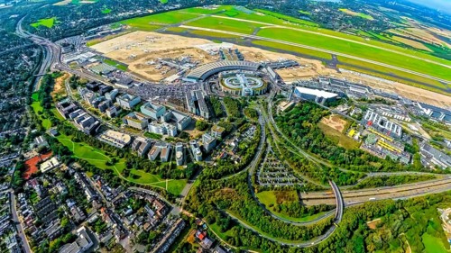 Aerial view, DUS Airport Düsseldorf with reception building and commercial area DUS Airport-City,