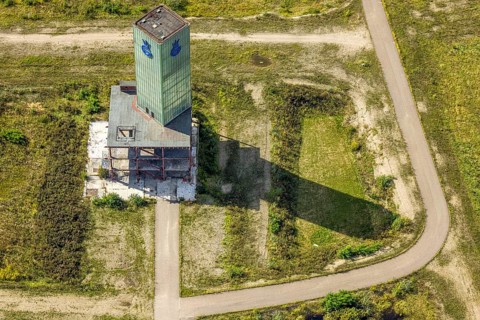 Aerial view, glassmaker's quarter, old building and historical sight of a former colliery with