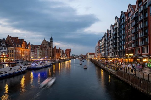 Illuminated promenade at sunset in the Old Town, Motlawa River, Gdansk, Poland