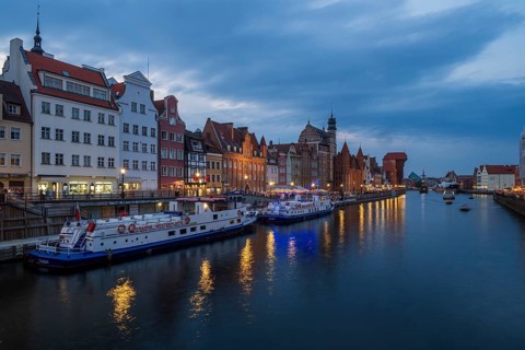 Illuminated promenade at sunset in the Old Town, Motlawa River, Gdansk, Poland