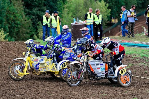 Motocross, Rudersberg, Baden-Württemberg, Germany, Europe, Several motocross riders in colourful