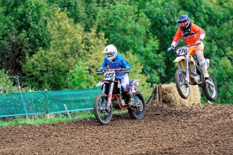 Motocross, Rudersberg, Baden-Württemberg, Germany, Europe, Two motocross riders during a jump over