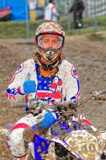 Motocross, Rudersberg, Baden-Württemberg, Germany, Europe, Motocross rider in muddy clothes gives