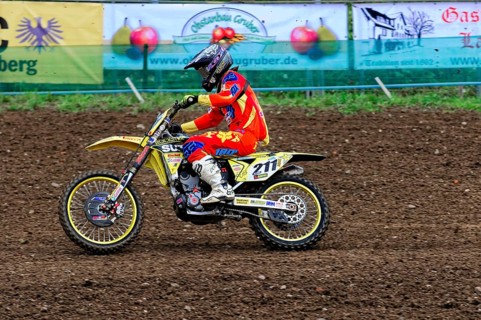 Motocross, Rudersberg, Baden-Württemberg, Germany, Europe, A rider on a yellow motorbike