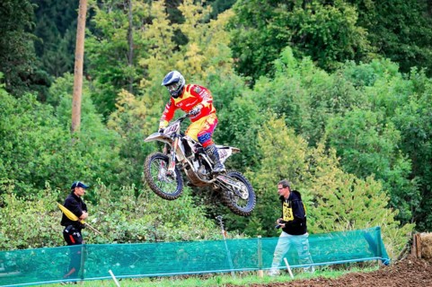 Motocross, Rudersberg, Baden-Württemberg, Germany, Europe, A rider in red protective clothing jumps