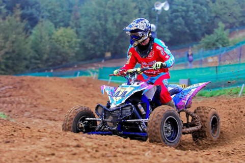Motocross, Rudersberg, Baden-Württemberg, Germany, Europe, Quad rider in red outfit on a muddy race