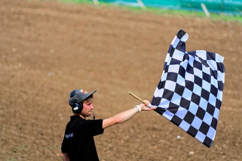 Motocross, Rudersberg, Baden-Württemberg, Germany, Europe, Man waving a black and white chequered