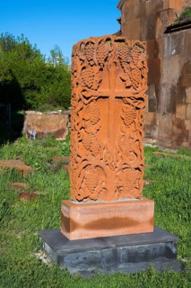 Decorated stone with cross motif in green surroundings, cross stone, Khachkar, Marmashen Monastery,