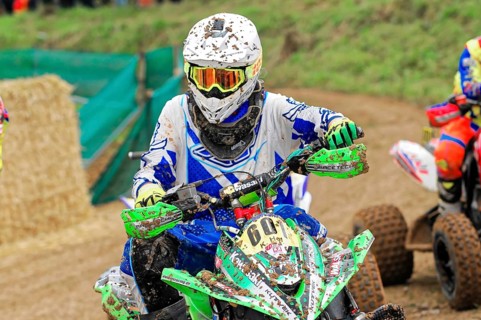 Motocross, Rudersberg, Baden-Württemberg, Germany, Europe, A heavily soiled quad rider in a blue