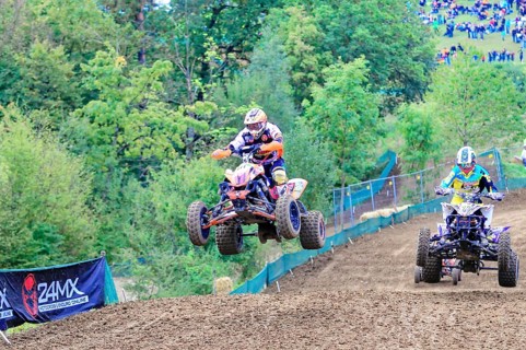 Motocross, Rudersberg, Baden-Württemberg, Germany, Europe, A quad bike rider jumps over a track