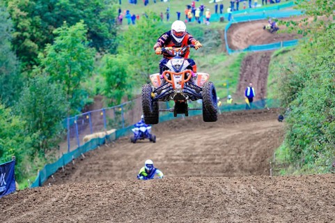 Motocross, Rudersberg, Baden-Württemberg, Germany, Europe, A quad bike rider jumps over a track