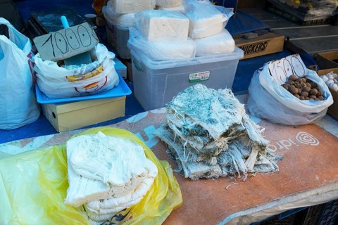 Various cheeses and walnuts for sale at a market stall, Gyumri, Gyumri, Shirak province, Armenia