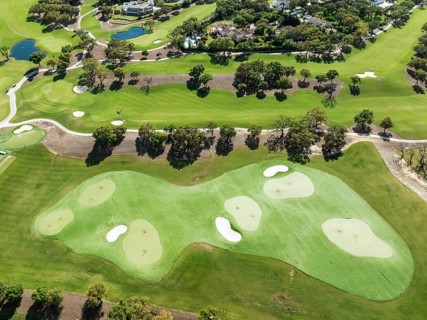 Driving range with greens and bunkers at the San Roque Club Golf Resort. Aerial view. Drone shot.