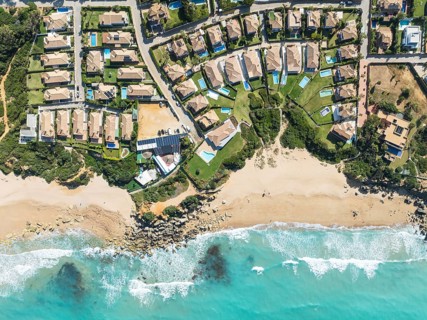 The Roche housing estate at the Mediterranean Sea. Aerial view. Drone shot. Cádiz province,