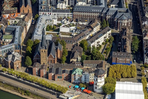 Aerial view, catholic basilica St. Lambertus and round tower shipping museum in the old town, roof