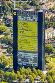 Aerial view, ARAG high-rise office building, slogan We celebrate the law and 90 years of ARAG,