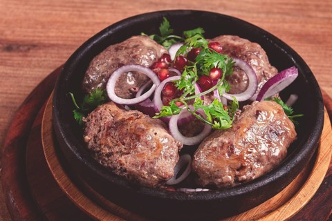 Fried apkhazura, cutlet in a fat grid, spicy, Georgian dish, fried on ketsi, homemade, no people