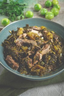 Chakapuli, Georgian dish, stewed meat with herbs and tkemali, in white wine, homemade, no people