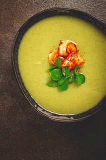 Pea cream soup, with shrimp, green soup, homemade, top view, no people