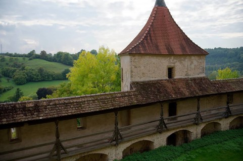 Medieval battlements at Comburg Castle, Benedictine monastery, Way of St James, pilgrimage route,
