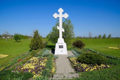 Orthodox cross on the entrance to the settlement. Krasnodar, Russia