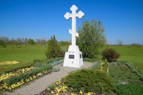 Orthodox cross on the entrance to the settlement. Krasnodar, Russia