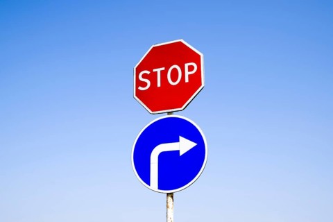 The road sign is stop. sign turn right. Krasnodar, Russia